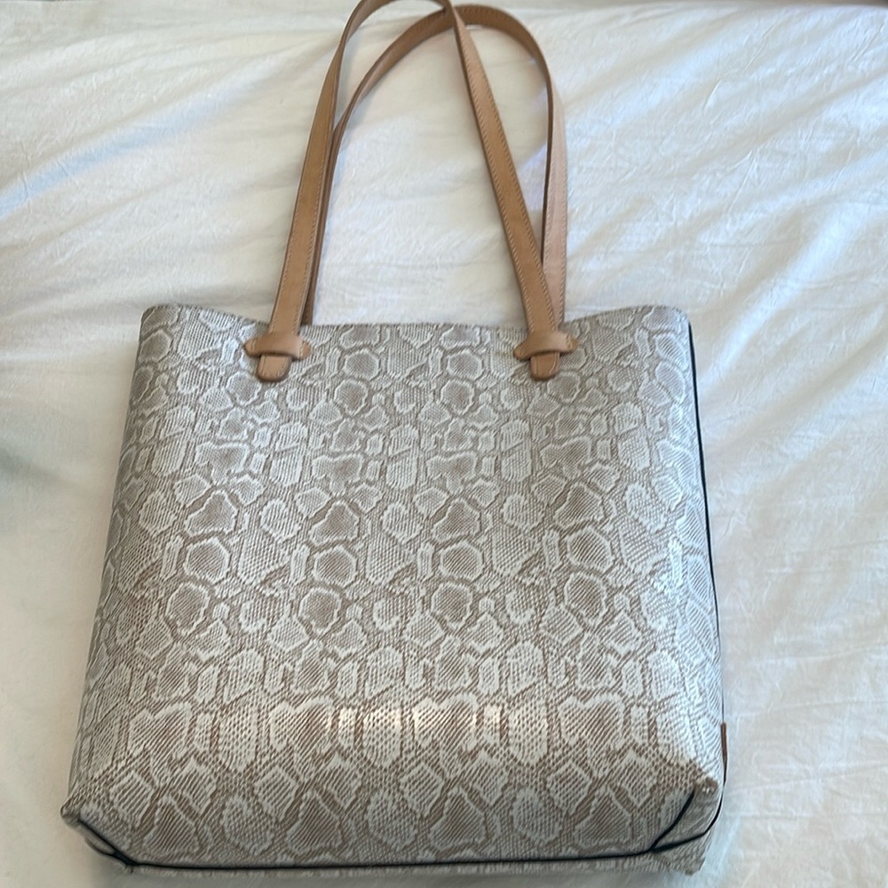 Consuela snake print purse!